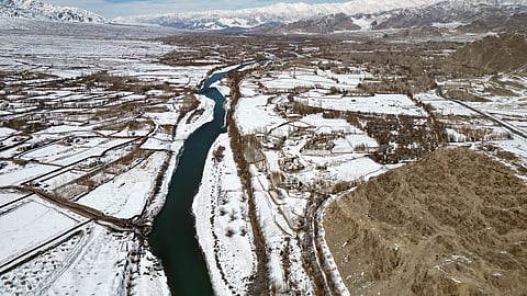 An aerial view of the Indus river amid the snow-capped area of Ladakh.
