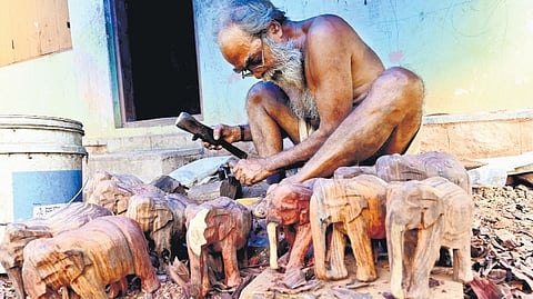For generations, hundreds of families here have earned their livelihood by crafting elephant sculptures from Indian rosewood