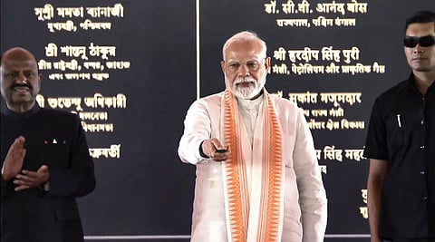 Prime Minister Narendra Modi unveils various development projects during a public meeting, in Durgapur, Paschim Bardhaman district, West Bengal.