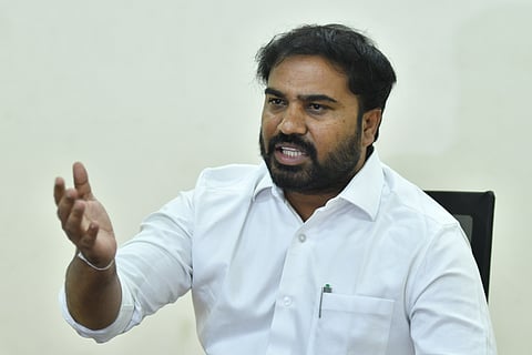SAAP chairman A Ravi Naidu addressing the media during the press conference in Vijayawada on Thursday.