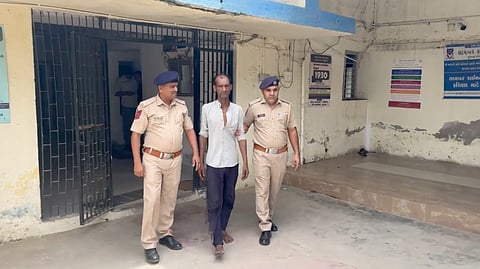 The accused Ashok Rawat under police custody.