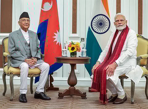 In this April 4, 2025, photo, Prime Minister Narendra Modi meets with Nepal Prime Minister K.P. Sharma Oli on the sidelines of the BIMSTEC meeting in Bangkok.