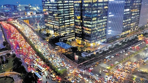 Vehicles caught in a traffic jam that stretched for miles following the heavy downpour in Hyderabad’s IT Corridor on Friday