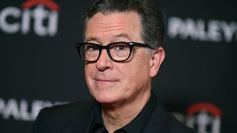 Stephen Colbert arrives at a screening of "The Late Show with Stephen Colbert," during PaleyFest, April 21, 2024, at the Dolby Theatre in Los Angeles.