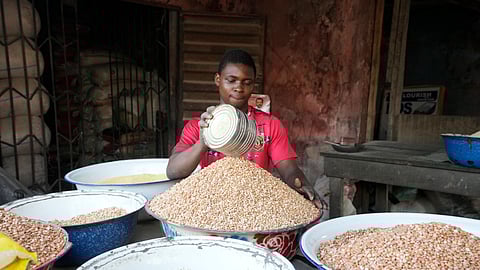 A man sells food at a market in Lagos, Nigeria, Tuesday, Feb 7, 2023.