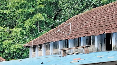 The roof of the bicycle shed at Thevalakkara school where Midhun was electrocuted after coming into contact with live wire
