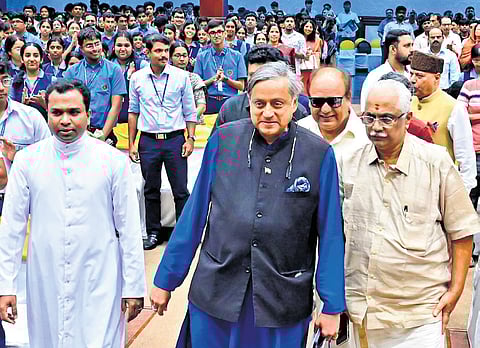 Congress MP Shashi Tharoor arriving to attend a function organised by the Council for Community Cooperation at TDM Hall in Kochi on Saturday