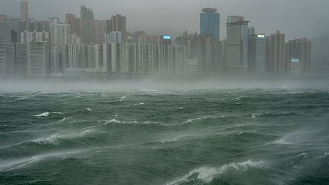 Waves are seen near the Victoria Harbor following the Typhoon Wipha, in Hong Kong, Sunday, July 20, 2025.