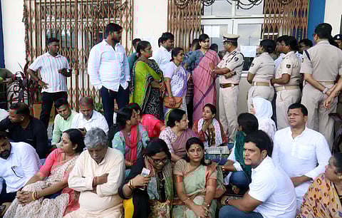 Members of the Biju Janata Dal hold a protest in the AIIMS Bhubaneswar premises in, demanding resignation of Deputy Chief Minister Prabhati Parida in relation to the girl who was set afire by miscreants on Saturday