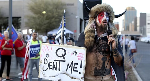 2021 US Capitol rioter Jacob Chansley—famously known as the QAnon Shaman—protests the results of the 2020 US presidential elections outside the Maricopa County recorder’s office in Arizona.