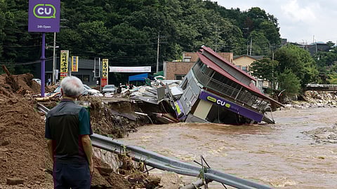 A damaged convenience store building is seen after heavy rains in Gapyeong, South Korea, Sunday, July 20, 2025.