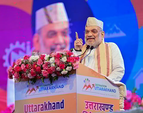 Union Home Minister Amit Shah addresses the Uttarakhand Nivesh Utsav Samaroh, in Rudrapur, Saturday, July 19, 2025