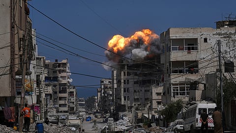 Smoke and flames erupt from an Israeli airstrike in Gaza City, Monday, July 21, 2025.
