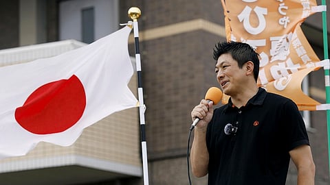 Sohei Kamiya, leader of the Sanseito party, speaks during an election campaign in Tosu, Saga prefecture, southwestern Japan, on July 12, 2025.