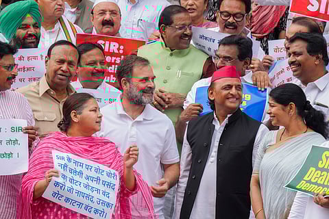 LoP in the Lok Sabha and Congress leader Rahul Gandhi with Samajwadi Party MP Akhilesh Yadav, RJD MP Misa Bharti, DMK MP Kanimozhi Karunanidhi and other INDIA bloc MPs stages a protest against the ongoing Special Intensive Revision (SIR) in Bihar, during the Monsoon session of Parliament, in New Delhi, Tuesday, July 22, 2025.