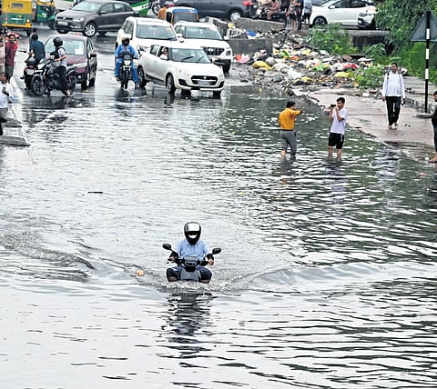 Heavy rain causes waterlogging, traffic congestions in Delhi on Wednesday.