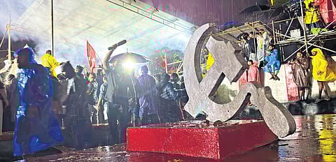Smoke rises from V S Achuthanandan’s funeral pyre at Valiyachudukadu in
Alappuzha on Wednesday