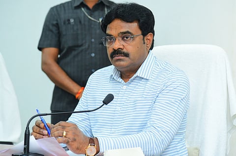 Bapatla collector J Venkata Murali addressing a review meeting on imposing ban on black burley cultivation across the district.