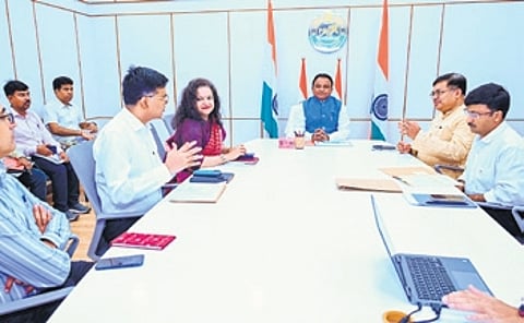 Majhi, Works min Harichandan and other senior officers during the review meeting.