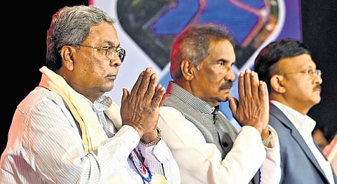Chief Minister Siddaramaiah and Power Minister K J Geroge and others during the kptcl 56th foundation day at Gnanajothi auditorium in Bengaluru on Wednesday.