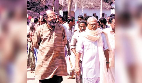 Thomas Isaac with V S Achuthananthan.