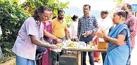 Health workers distributing medicines in an affected village of Ganjam.