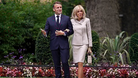 French President Emmanuel Macron and his wife Brigitte arrive at 10 Downing Street in London, Wednesday, July 9, 2025.