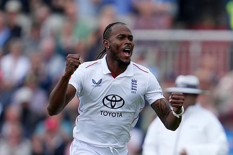 England's Jofra Archer celebrates the dismissal of India's Ravindra Jadeja during the second day of the fourth Test at Old Trafford, Manchester (Photo | AP)