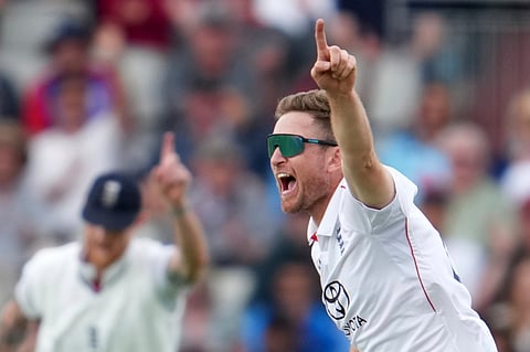 England's Liam Dawson celebrates the dismissal of India's Yashasvi Jaiswal during the fourth cricket test match between England and India at Emirates Old Trafford, Manchester, England, Wednesday, July 23, 2025.