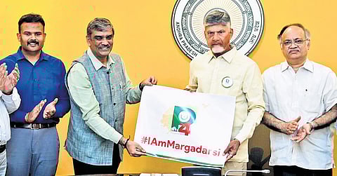 Chief Minister N Chandrababu Naidu unveiled #IAmMargadarsi poster | express