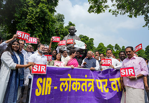 Leader of Opposition in Lok Sabha Rahul Gandhi, Leader of Opposition in Rajya Sabha Mallikarjun Kharge, Congress MPs Priyanka Gandhi Vadra, Gaurav Gogoi, and other MPs from the INDIA bloc parties stage a protest over the Special Intensive Revision (SIR) of Electoral Rolls in Bihar, during the Monsoon session of Parliament, in New Delhi, Friday, July 25, 2025.