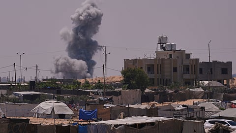 Smoke rises to the sky following an Israeli army airstrike in Khan Younis, southern Gaza Strip.