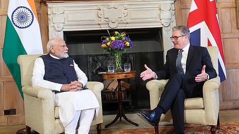 In this image released by PMO on July 24, 2025, Prime Minister Narendra Modi with his British counterpart Keir Starmer during a meeting.