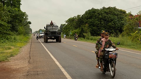A Cambodian military convoy drives towards the border city of Samrong in Oddar Meanchey Province, Cambodia, on Saturday, July 26, 2025.