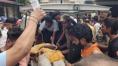 A person injured in the Mansa Devi temple stampede being taken to a hospital in Haridwar on Sunday, July 27, 2025.