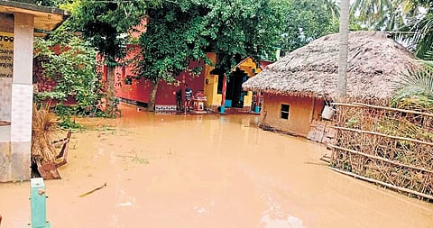 Flood-inundated houses in Dhamnagar area of Bhadrak district.