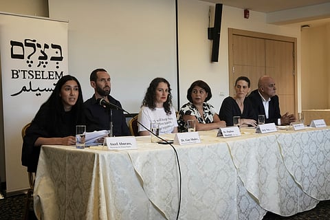 Aseel Aburass, left, of PHRI (Physicians for human Rights Israel) speaks at a press conference with B'Tselem, the Israeli Information Center for Human Rights in the Occupied Territories, releasing a report, "Our Genocide," calling the war in Gaza a genocide, and PHRI's legal-medical analysis of the systematic destruction of Gaza's healthcare system, in Jerusalem, Monday, July 28, 2025