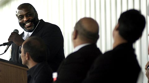 International Boxing Hall of Fame inductee Dwight Muhammad Qawi glances at fellow inductees from left, Daniel Zaragoza, Stanley Christodoulou, and Carlos Palomino during his induction acceptance speech Sunday, June 13, 2004.