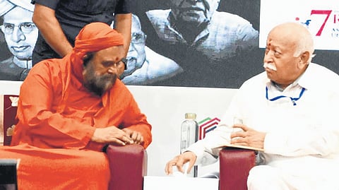 Swami Purnamritananda Puri, general secretary of Mata Amritanandamayi Math, with RSS chief Mohan Bhagwat on the concluding day of the four-day Gyan Sabha organised by Shiksha Samskriti Utthan Nyas in Kochi on Monday
