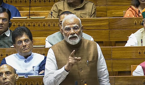 Prime Minister Narendra Modi speaks during a debate in the Lok Sabha on the Pahalgam terror attack and Operation Sindoor, at the Monsoon session of Parliament, in New Delhi, Tuesday, July 29, 2025.