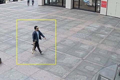 This image from surveillance video obtained by The Associated Press shows Shane Tamura outside a Manhattan office building on Monday, July 28, 2025 in New York.