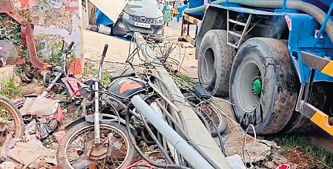 The water tanker crashed into multiple parked vehicles and came to a halt after hitting an electric pole; the deceased Dhanapal (top) and Devi