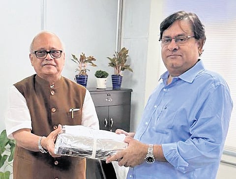 Justice PC Ghose submits his report to Irrigation Secretary Rahul Bojja at BRKR Bhavan in Hyderabad on Thursday