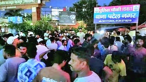 Hundreds from a specific community converged on the ISBT police outpost last night, staging a strong protest and demanding stringent action against the accused.
