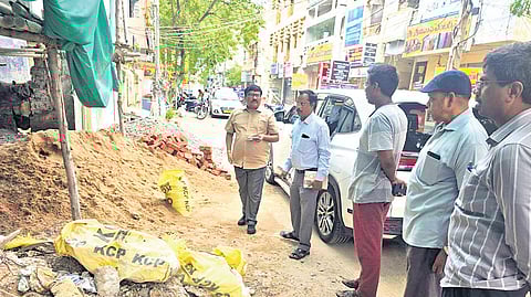 GMC Commissioner P Srinivasulu inspecting illegal encroachments in the city on Sunday.