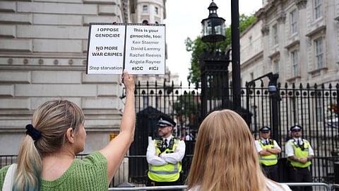 People take part in a protest outside Downing Street in London on Tuesday, July 29, 2025, as Prime Minister Keir Starmer gathered senior ministers for an urgent Cabinet meeting on Gaza.