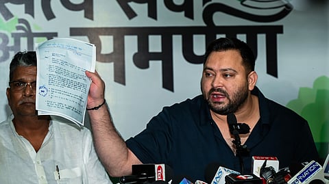 RJD leader and LoP in the Bihar assembly, Tejashwi Yadav, addresses a press conference as EC releases the draft voters list in Patna on Saturday, Aug. 2, 2025.