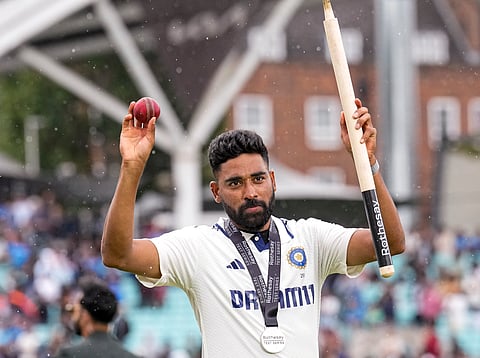 Mohammed Siraj poses with the ball and a stump after India's six-run win over England to tie the five-Test series