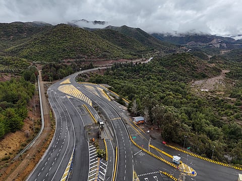 Aerial view of the entrance to the El Teniente mine where operations had been suspended since Friday after a "seismic event" caused the collapse of a tunnel the day before, trapping the five miners inside.