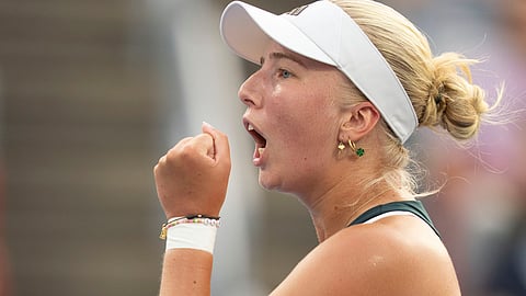 Clara Tauson, of Denmark, reacts during her match against Iga Swiatek, of Poland, during round of 16 action at the National Bank Open women's tennis tournament in Montreal, Sunday, Aug. 3, 2025.